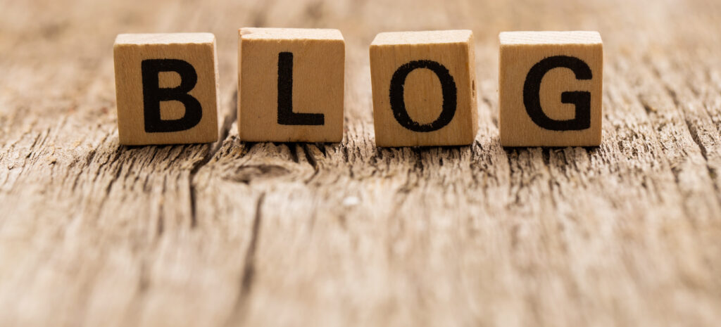 Key blogs for your blog business concept. Wooden toy blocks reads BLOG.