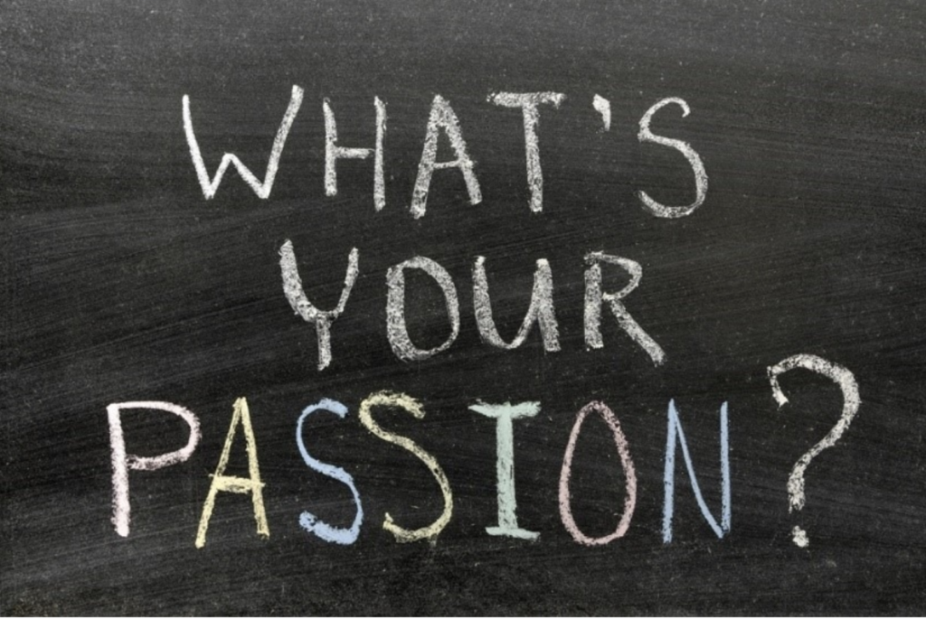 A chalkboard has the words: What's your passion" written on it. Writing passion concept.