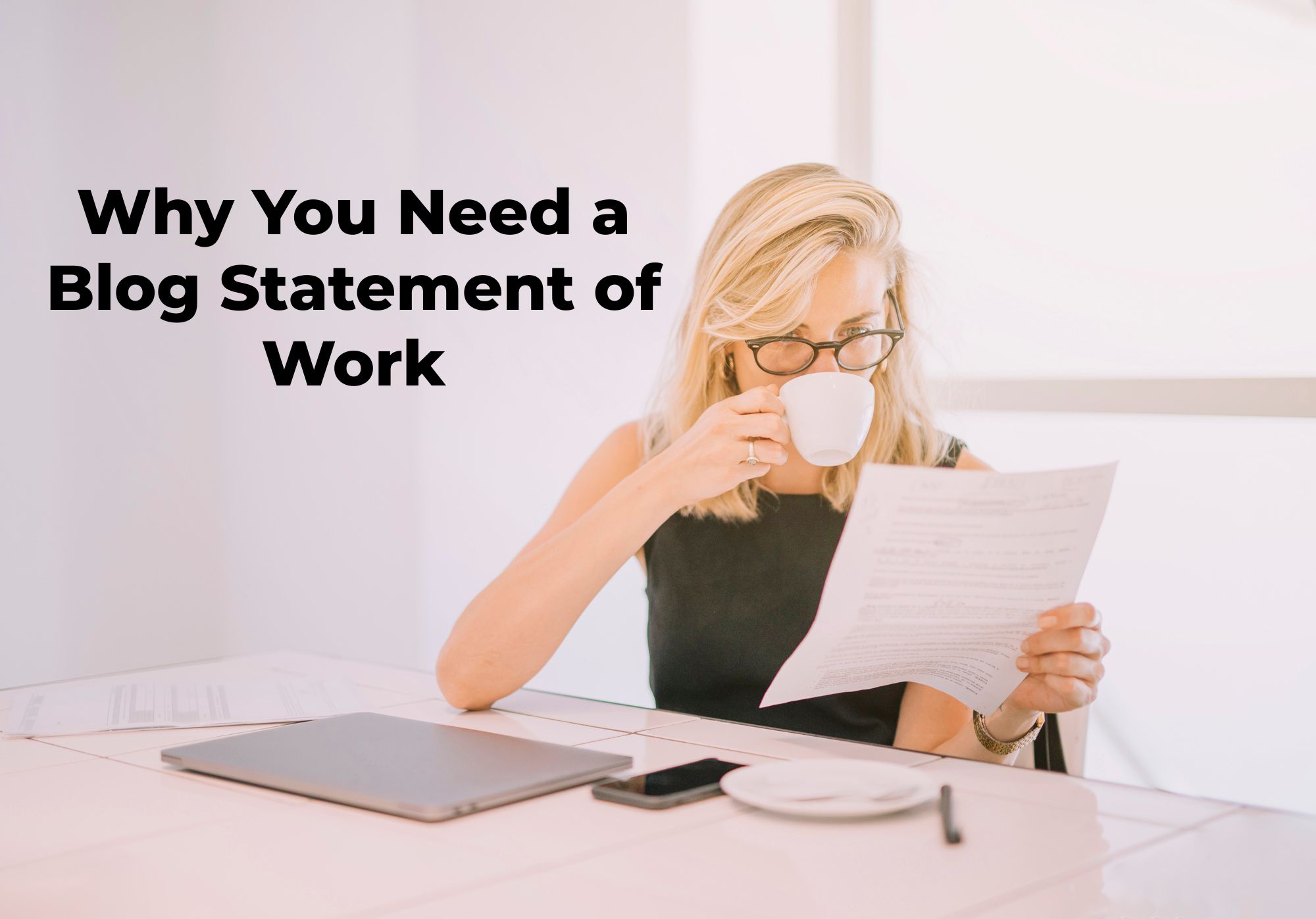 Photo of young businesswoman drinking coffee while reading the document in the office. Courtesy of Freepik.