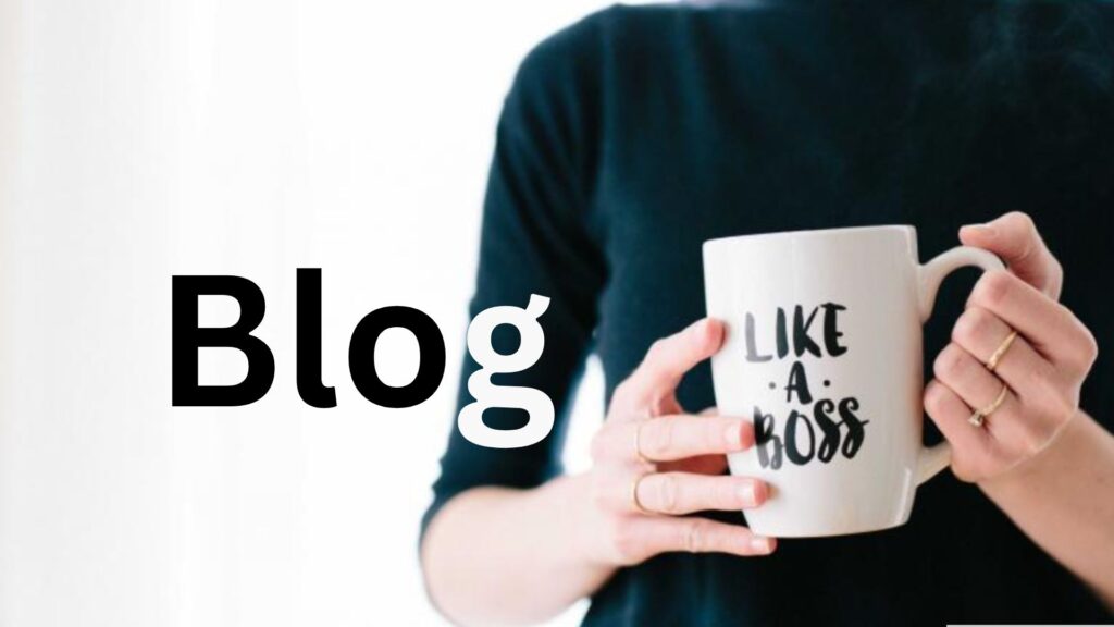 Woman holding a coffee cup that reads "like a boss."